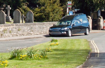 hearse outside church